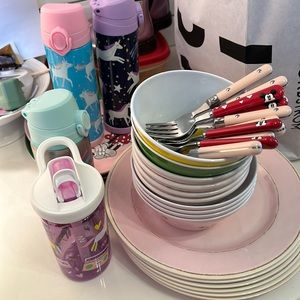 Lot of Pottery Barn kids plates etc.